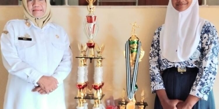 SMPN 1 Sukadana Ciamis  meraih Juara Umum dan  mendapat predikat Smasher Terbaik.